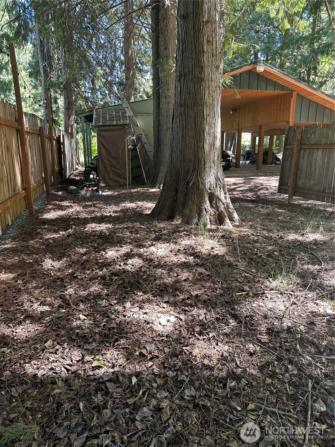 301 McElroy Road Cle Elum, WA 98922 - Photo 18 of 19 a view of a barn in the middle of a yard