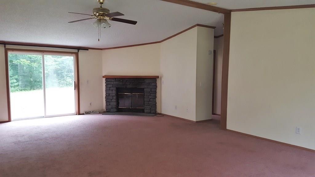 30 Bush Road Canaan, ME 04924 - Photo 7 of 25 great room w/ slider to back yard