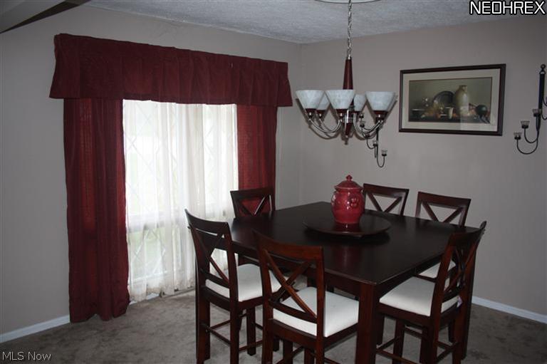 341 Edmore Road Akron, OH 44333 - Photo 3 of 25 Formal Dining area opens to Living Room and is off Family room