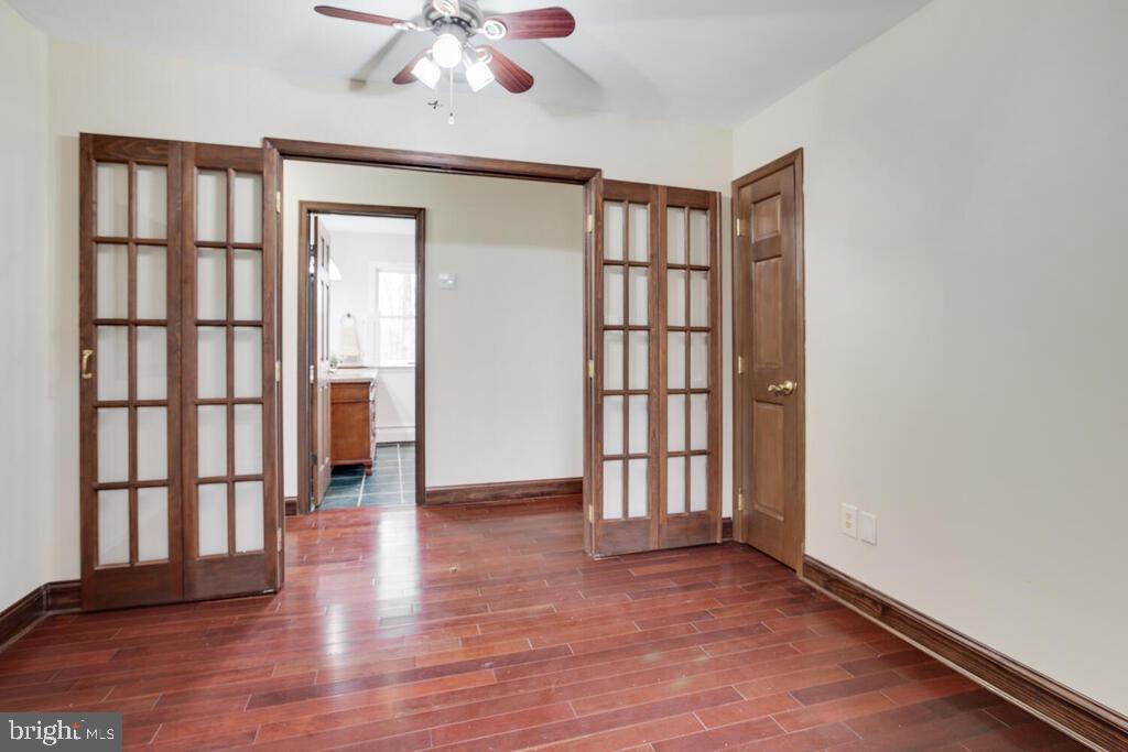 936 Grace Road Huntingtown, MD 20639 - Photo 37 of 64 wooden floor in an empty room with a window