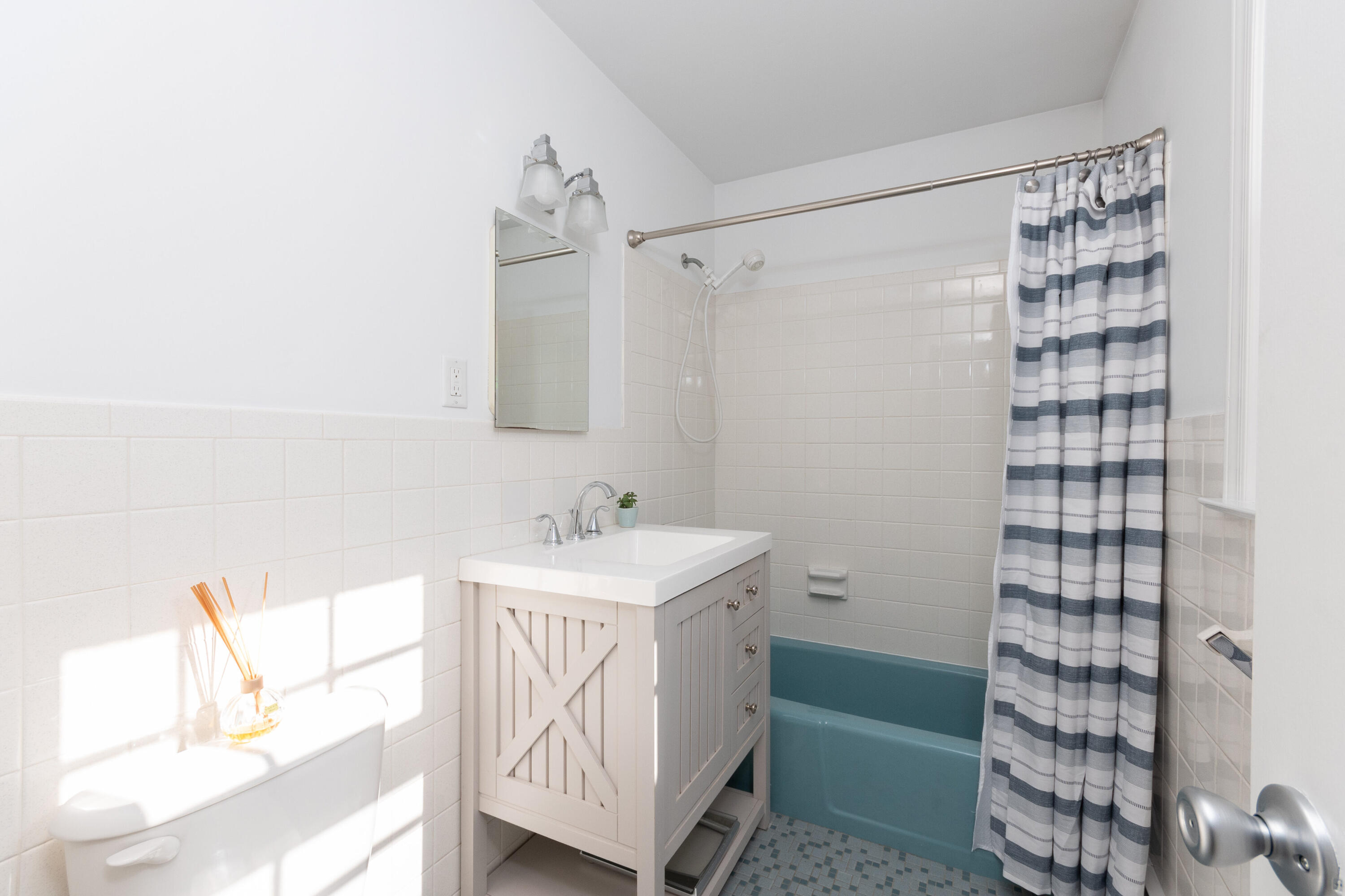 11 Cottontail Road Norwalk, CT 06854 - Photo 26 of 47 a bathroom with a sink and a mirror