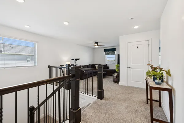 a view of a hallway with workspace