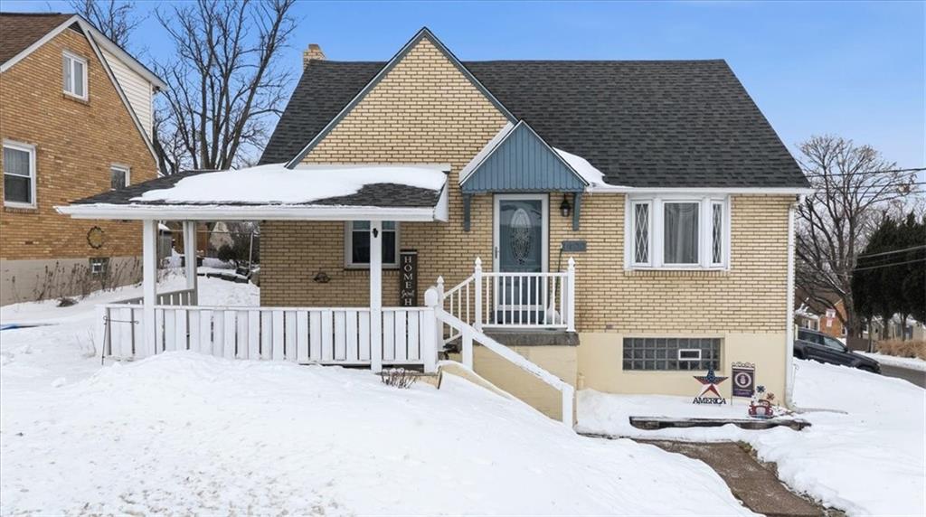 a front view of a house with a patio