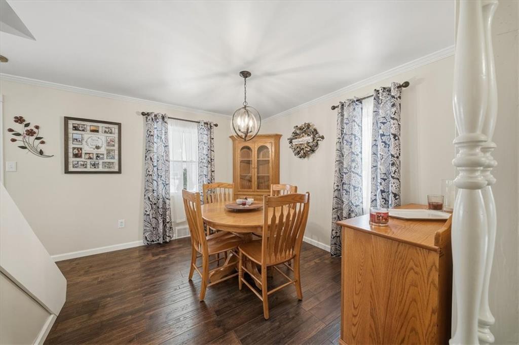 1400 Hamilton Road Pittsburgh, PA 15234 - Photo 11 of 36 a view of a dining room with furniture window and wooden floor