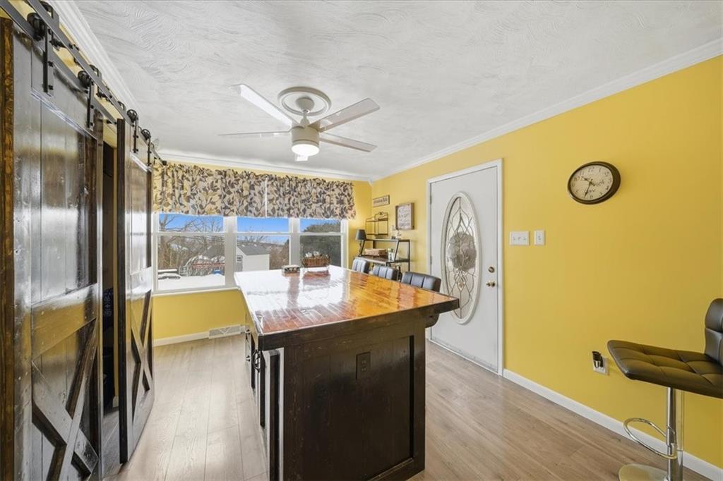 1400 Hamilton Road Pittsburgh, PA 15234 - Photo 15 of 36 a dining hall with stainless steel appliances granite countertop a granite counter tops and a refrigerator