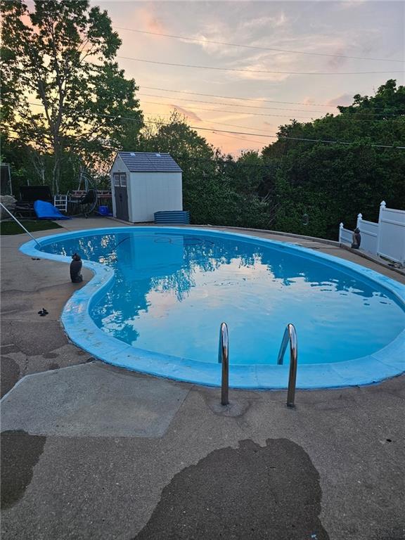 1400 Hamilton Road Pittsburgh, PA 15234 - Photo 18 of 36 a view of a swimming pool with a yard