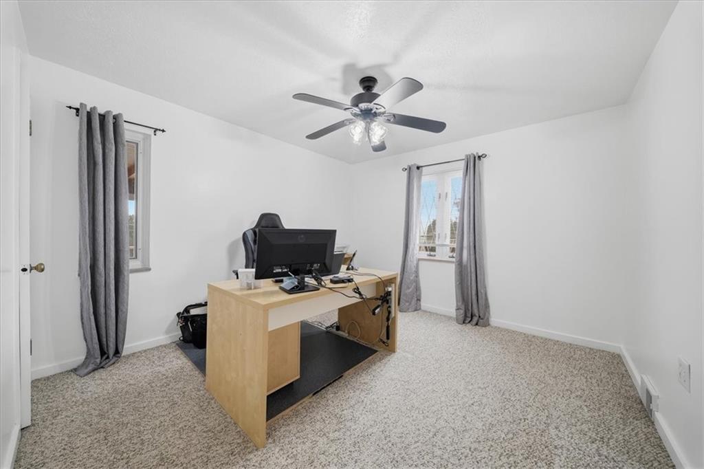 1400 Hamilton Road Pittsburgh, PA 15234 - Photo 20 of 36 a view of a workspace with furniture and a ceiling fan