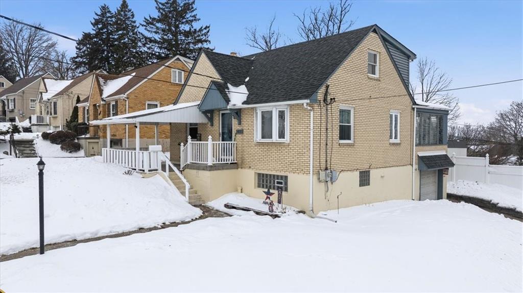 1400 Hamilton Road Pittsburgh, PA 15234 - Photo 2 of 36 a view of a white house with a yard
