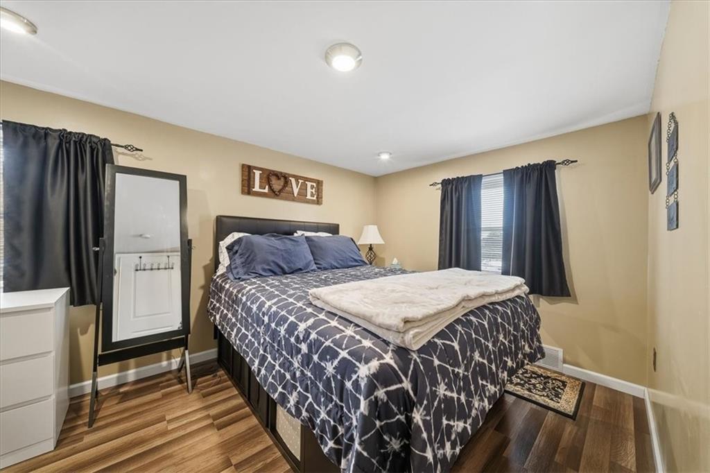 1400 Hamilton Road Pittsburgh, PA 15234 - Photo 25 of 36 a bedroom with a bed and a dresser