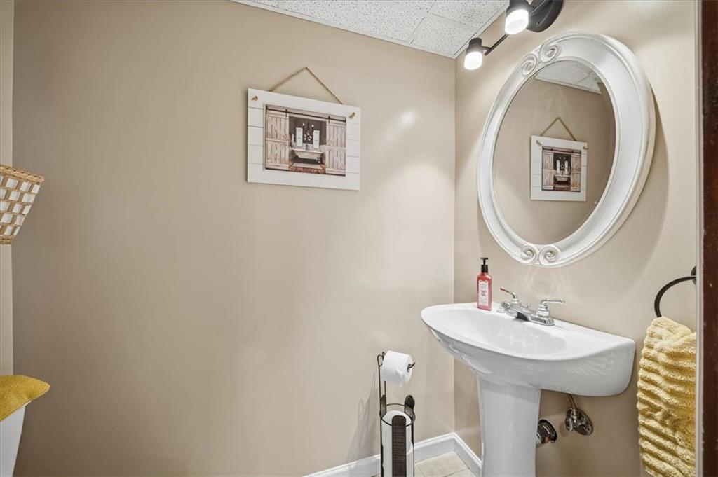 1400 Hamilton Road Pittsburgh, PA 15234 - Photo 31 of 36 a bathroom with a sink and a mirror