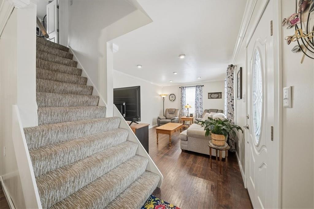 1400 Hamilton Road Pittsburgh, PA 15234 - Photo 9 of 36 a living room with furniture and a flat screen tv