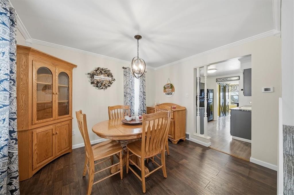 1400 Hamilton Road Pittsburgh, PA 15234 - Photo 10 of 36 a view of a dining room with furniture window and wooden floor