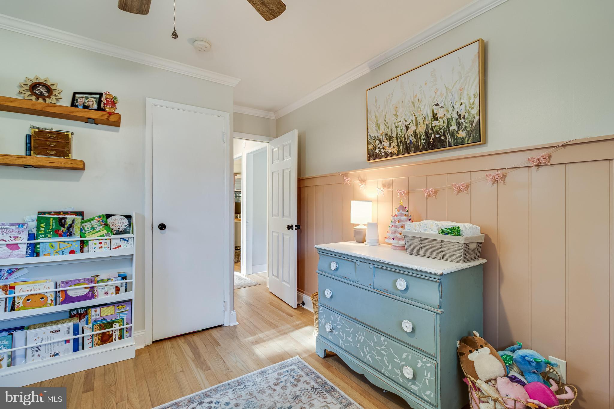 40905 Spring House Lane Leonardtown, MD 20650 - Photo 25 of 50 a room with a baby crib and a dresser