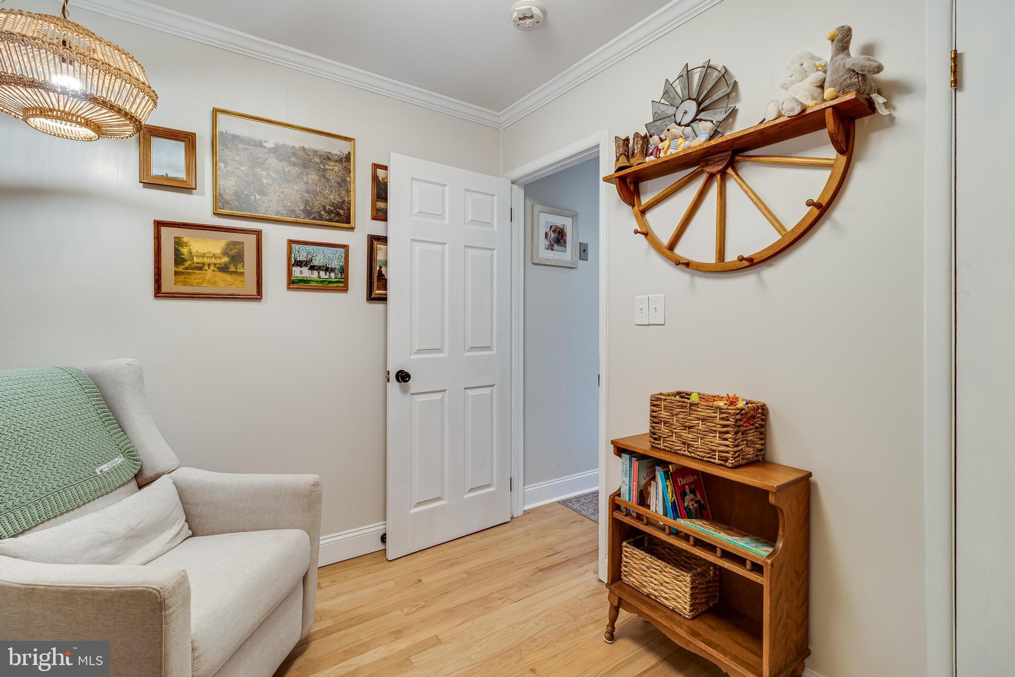 40905 Spring House Lane Leonardtown, MD 20650 - Photo 27 of 50 a living room with furniture and a window