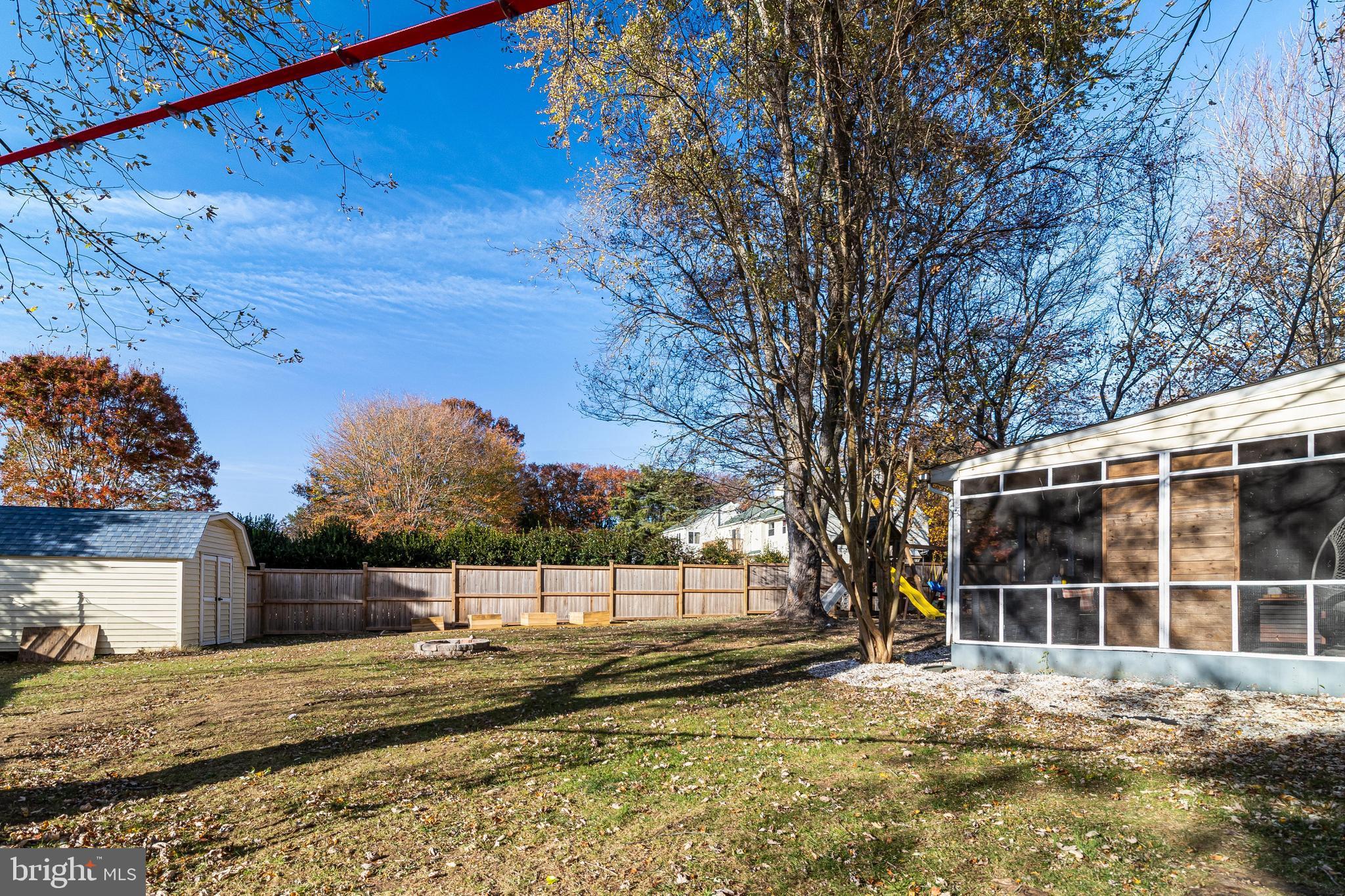 40905 Spring House Lane Leonardtown, MD 20650 - Photo 37 of 50 a view of a house with a yard