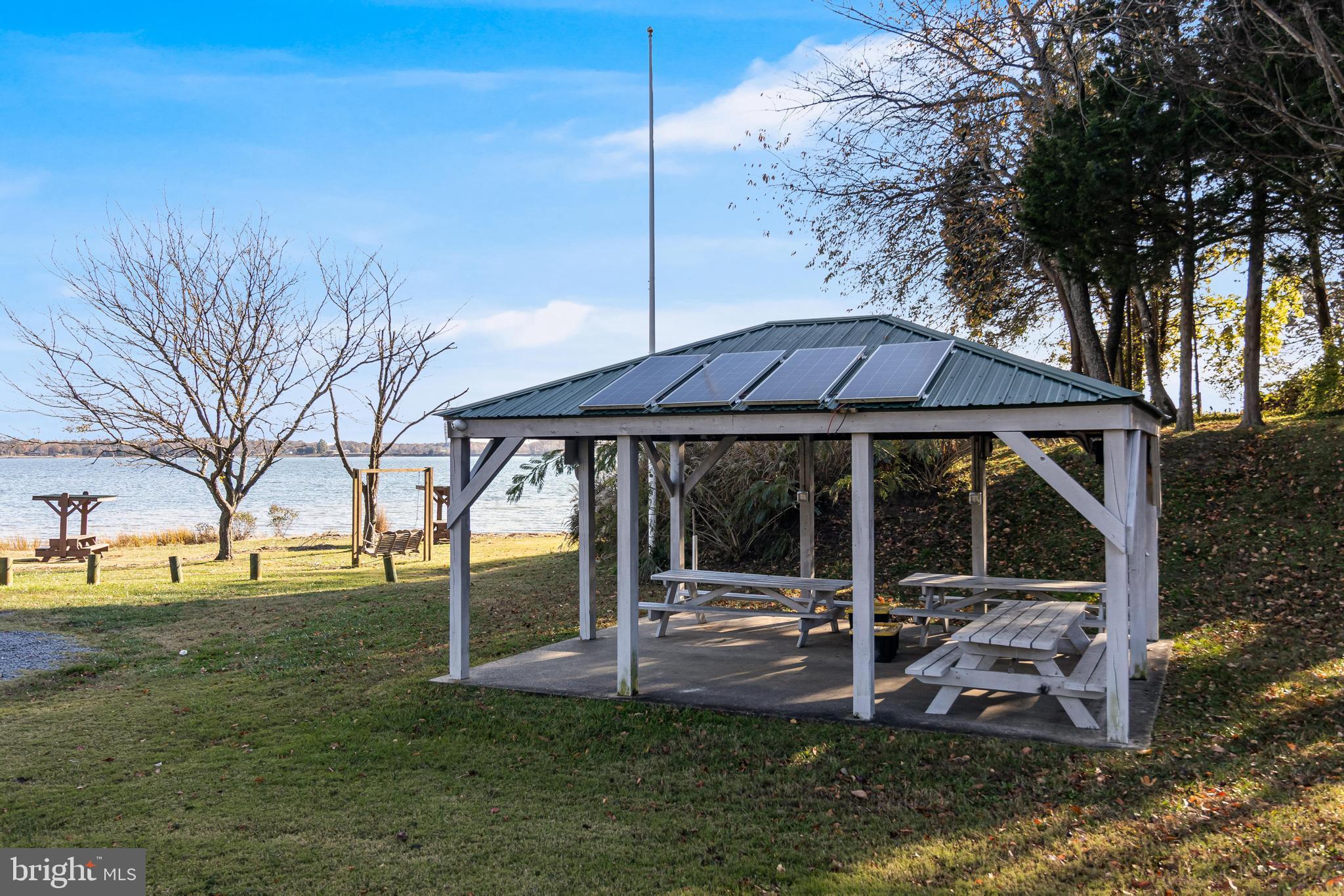 40905 Spring House Lane Leonardtown, MD 20650 - Photo 39 of 50 a view of a house with backyard and sitting area