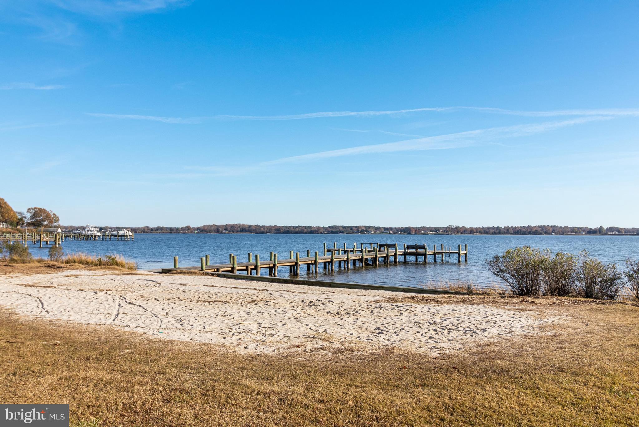 40905 Spring House Lane Leonardtown, MD 20650 - Photo 40 of 50 a view of swimming pool with a table and chairs in the ocean
