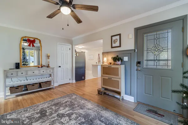 a bedroom with furniture and window