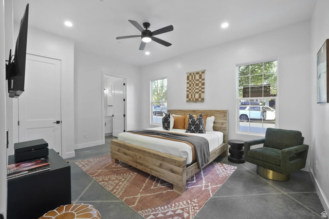 4346 Canterbury Road Hurricane, UT 84737 - Photo 15 of 37 Bedroom featuring finished concrete flooring, a ceiling fan, recessed lighting, and connected bathroom