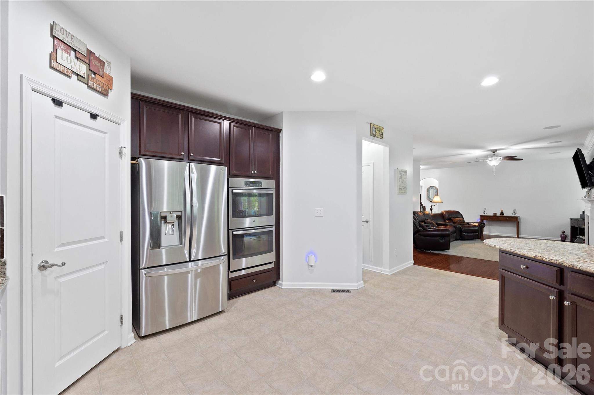 4237 Little Fork Cove Road Denver, NC 28037 - Photo 12 of 40 a kitchen with a refrigerator and a sink