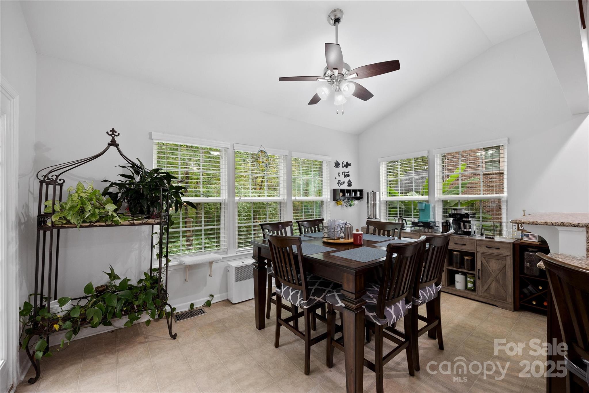 4237 Little Fork Cove Road Denver, NC 28037 - Photo 13 of 38 a view of a dining room and livingroom with furniture window and wooden floor