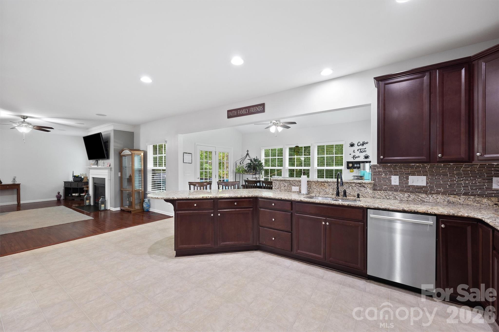4237 Little Fork Cove Road Denver, NC 28037 - Photo 13 of 40 a large kitchen with lots of counter space and sink