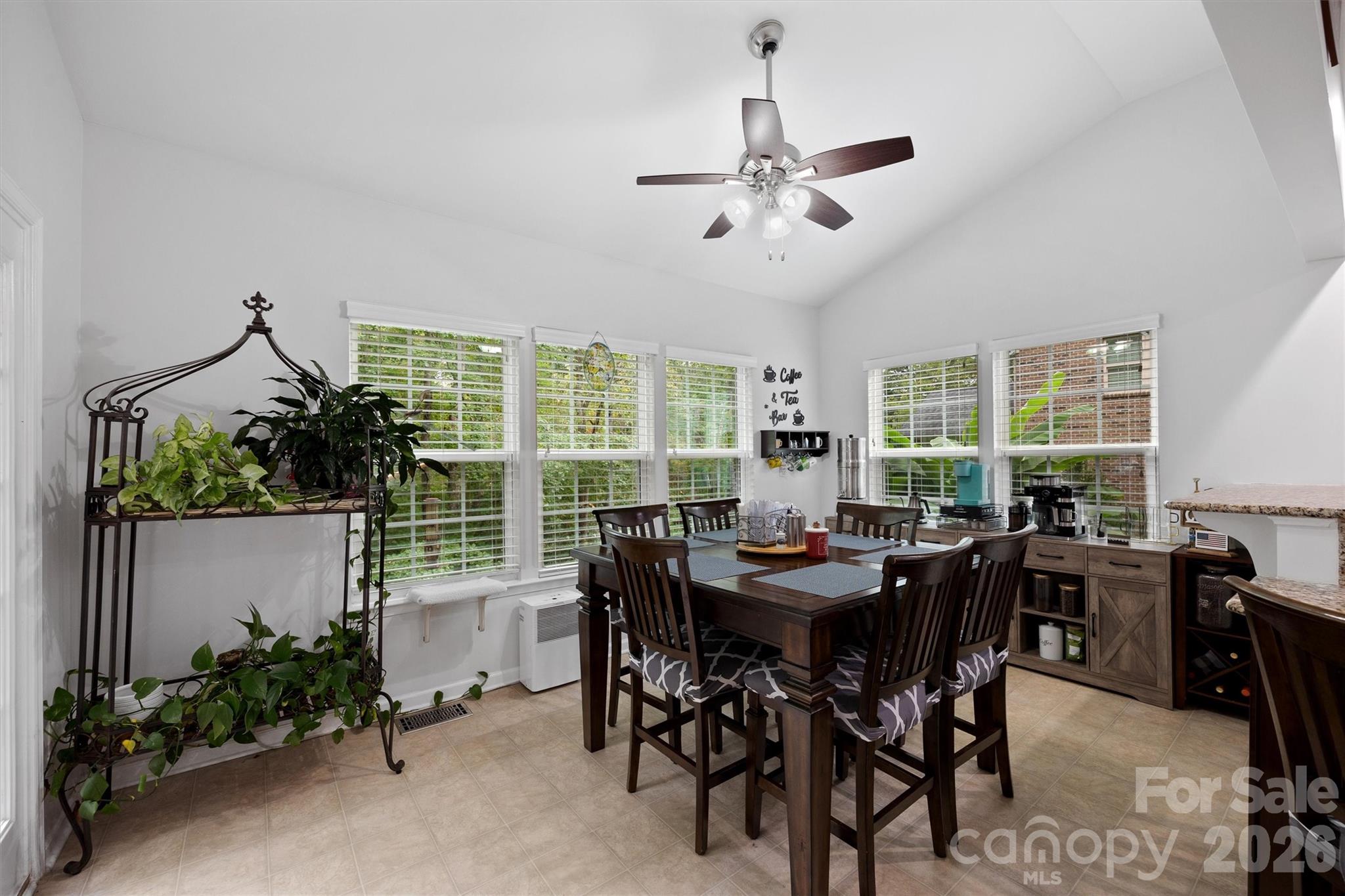 4237 Little Fork Cove Road Denver, NC 28037 - Photo 14 of 40 a view of a dining room and livingroom with furniture window and wooden floor