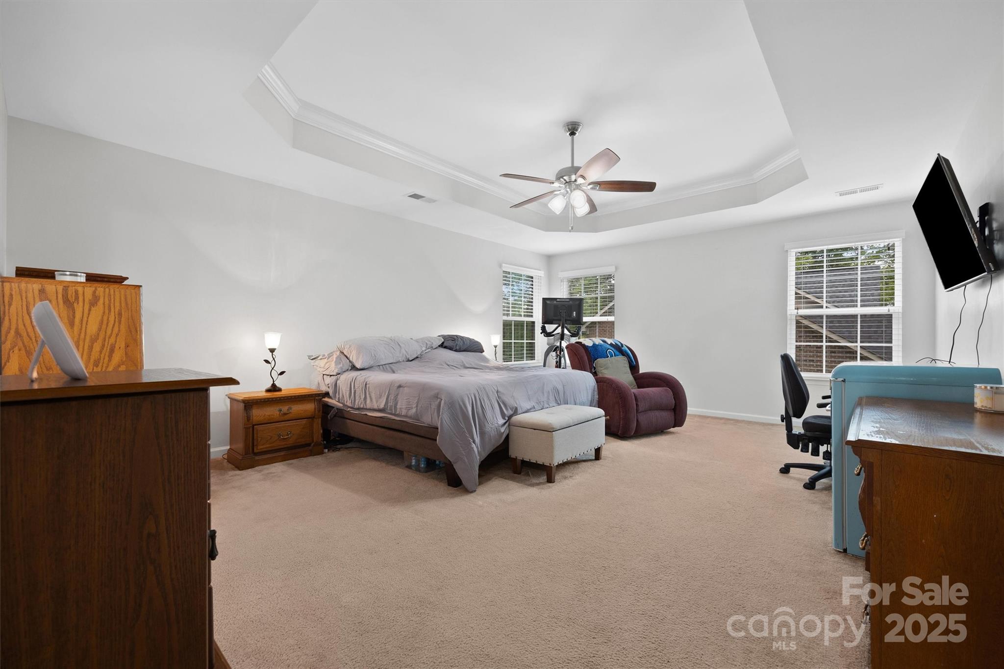 4237 Little Fork Cove Road Denver, NC 28037 - Photo 19 of 38 a spacious bedroom with a bed and furniture