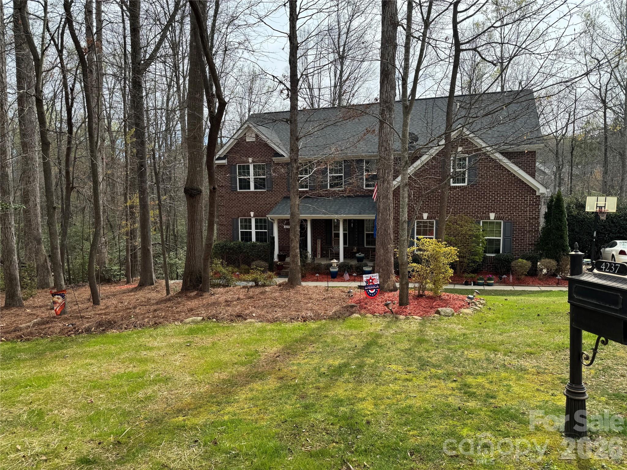 4237 Little Fork Cove Road Denver, NC 28037 - Photo 2 of 40 a view of a house with backyard porch and sitting area