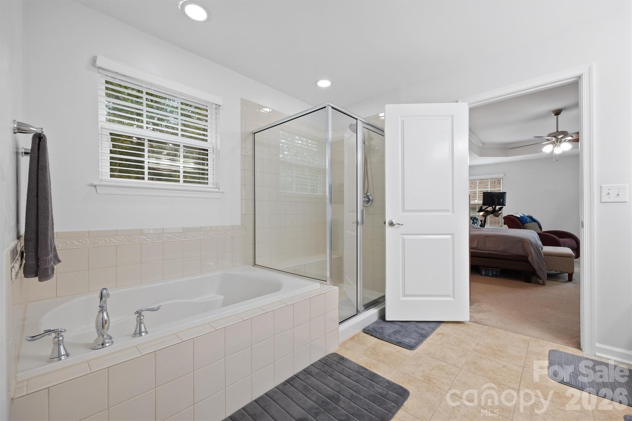 4237 Little Fork Cove Road Denver, NC 28037 - Photo 24 of 40 a en suite spacious bathroom with a tub and a shower