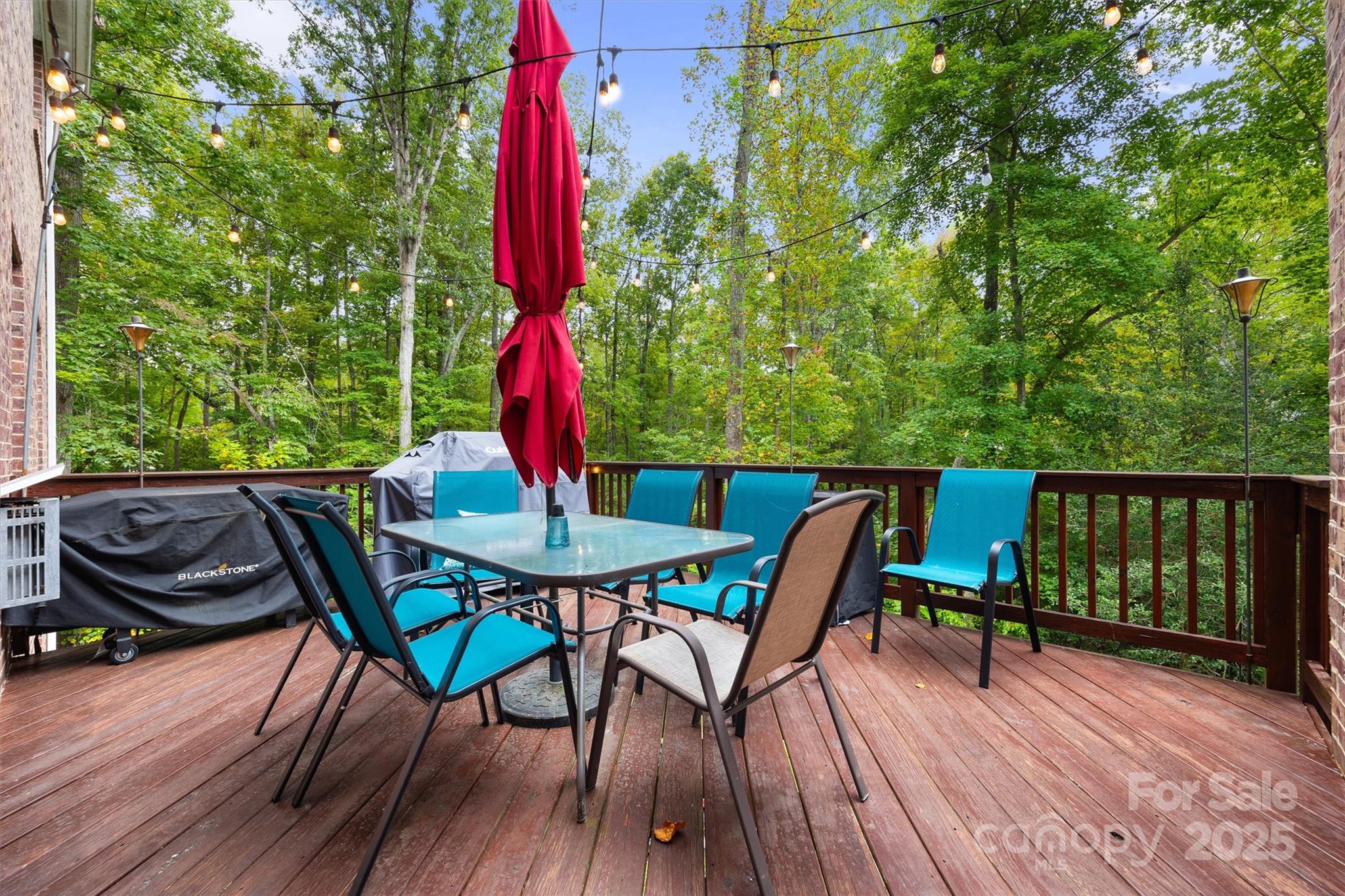 4237 Little Fork Cove Road Denver, NC 28037 - Photo 28 of 38 a view of a chairs and table on the deck