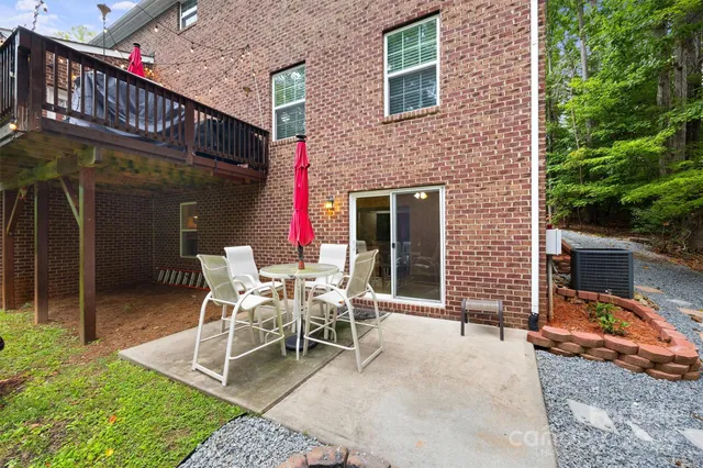 a chairs and table in front of a building