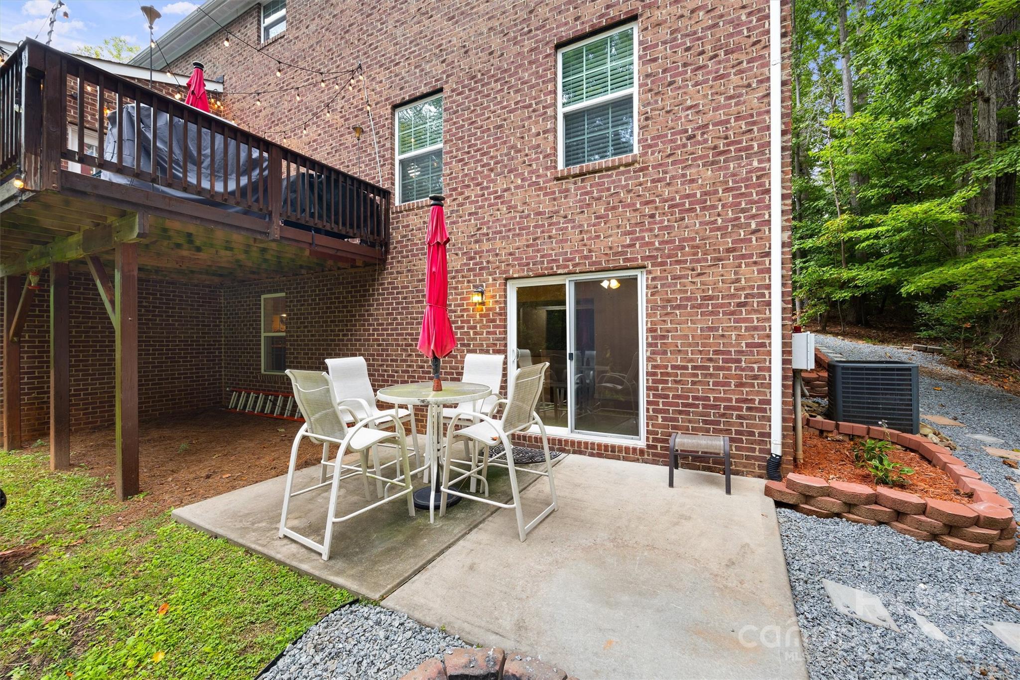 4237 Little Fork Cove Road Denver, NC 28037 - Photo 34 of 38 a chairs and table in front of a building
