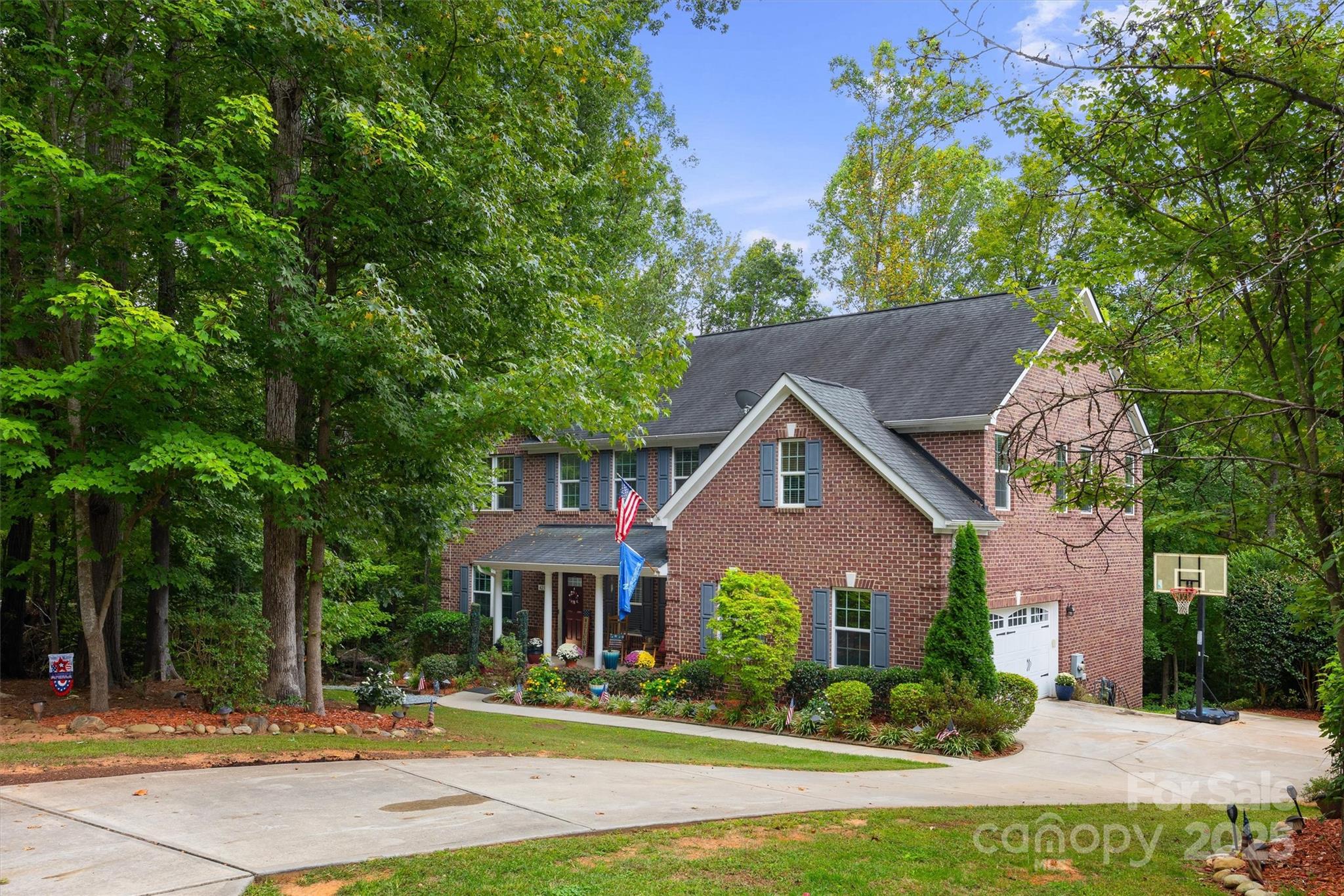 4237 Little Fork Cove Road Denver, NC 28037 - Photo 37 of 38 front view of a house with a yard