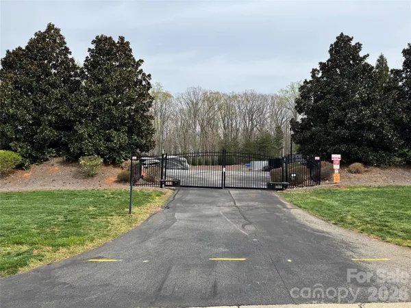 a view of backyard with sitting area