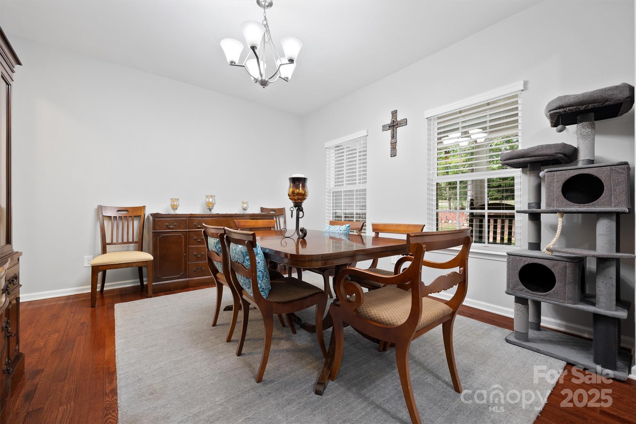 4237 Little Fork Cove Road Denver, NC 28037 - Photo 4 of 38 a view of a dining room with furniture and chandelier