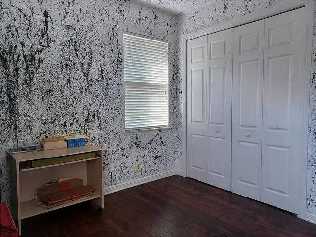 a kitchen with a stove and a microwave