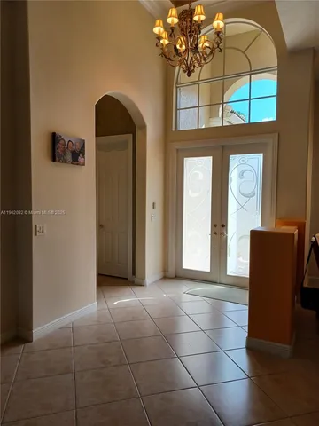 a view of a livingroom with furniture and cabinet
