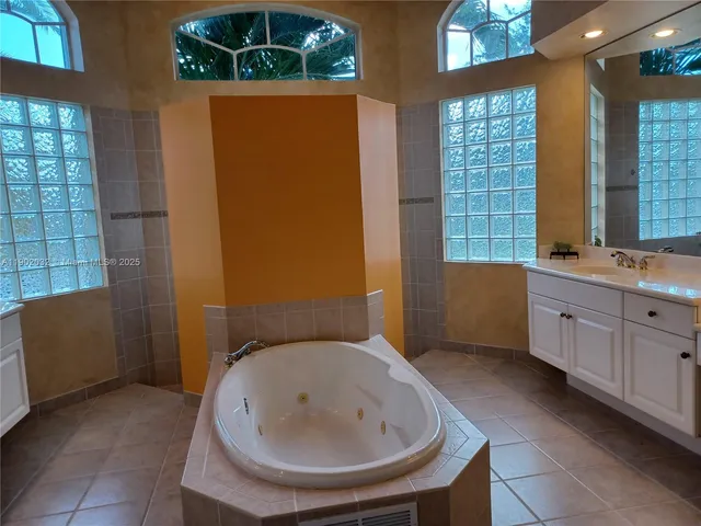 a bathroom with a sink and a bathtub