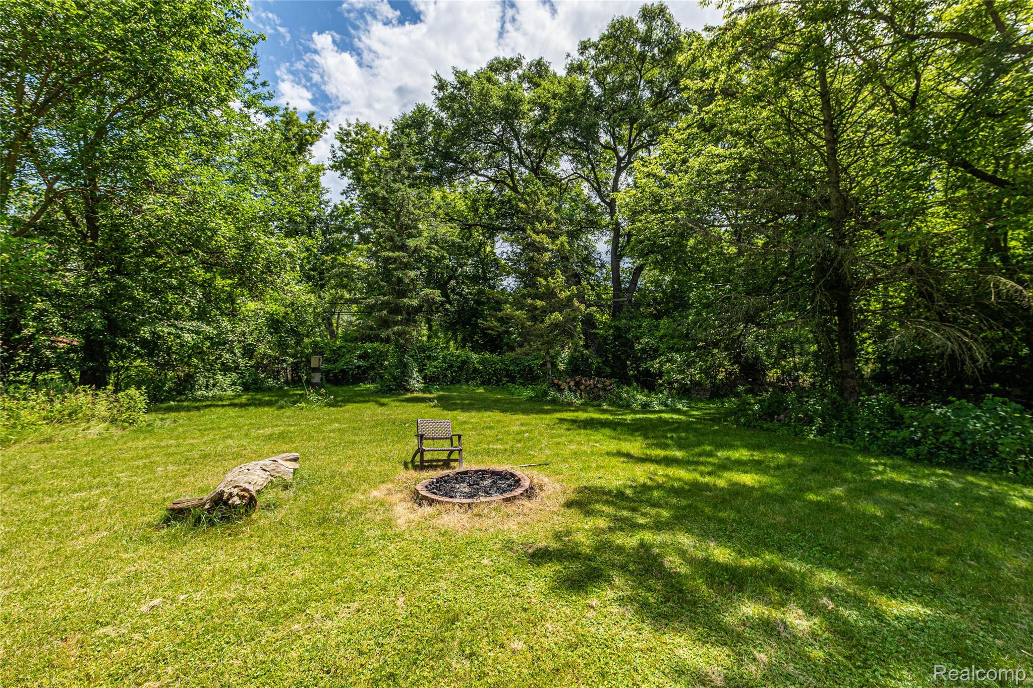 3139 Willet Avenue Rochester, MI 48309 - Photo 36 of 37 Bonfire surrounded by nature