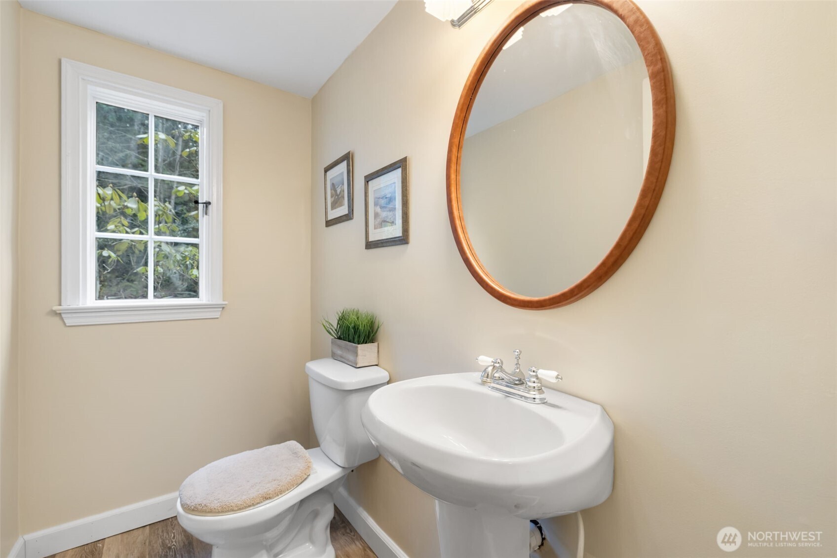 9520 Dishman Road Northwest Bremerton, WA 98312 - Photo 16 of 38 a bathroom with a sink a toilet and a mirror