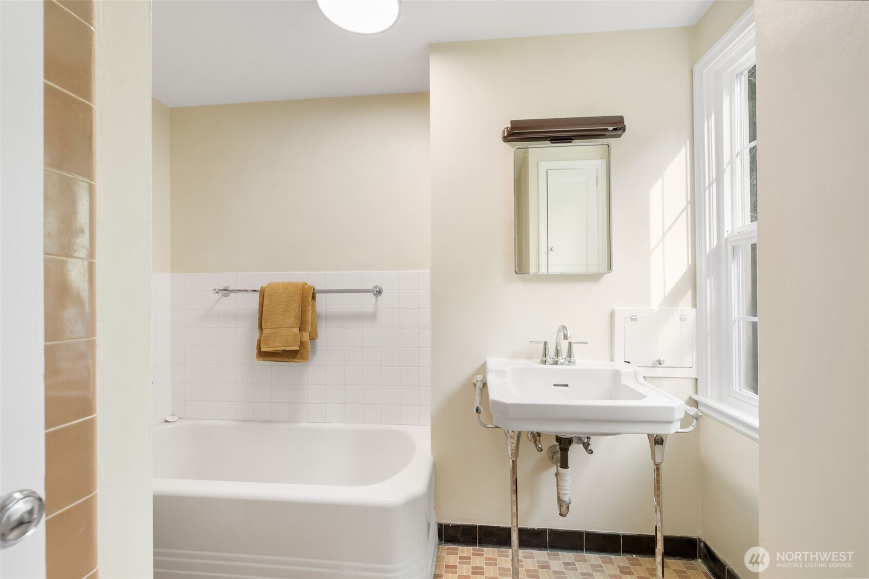9520 Dishman Road Northwest Bremerton, WA 98312 - Photo 28 of 38 a bathroom with a sink and a mirror
