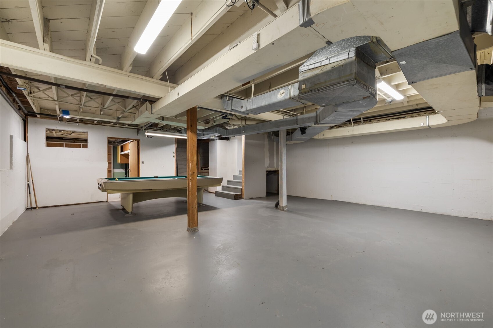 9520 Dishman Road Northwest Bremerton, WA 98312 - Photo 30 of 38 a view of empty room with wooden floor