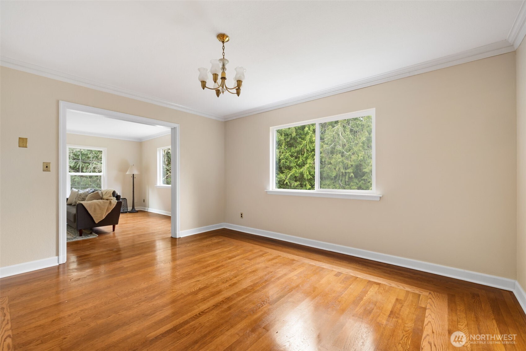 9520 Dishman Road Northwest Bremerton, WA 98312 - Photo 9 of 38 a view of a livingroom with a window and wooden floor