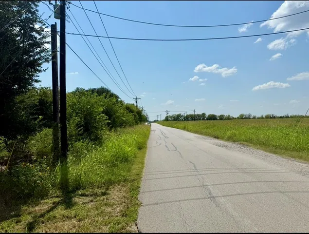 a view of a golf course with a lake