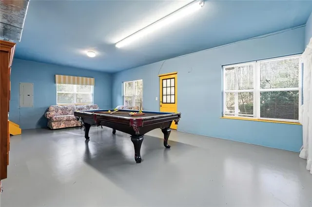 a room with furniture and a window