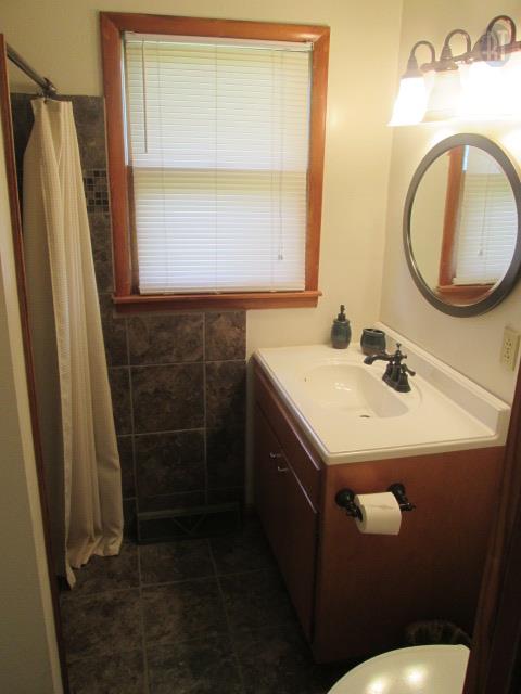 599 Cortner Road Normandy, TN 37360 - Photo 10 of 21 a bathroom with a sink a toilet and a mirror
