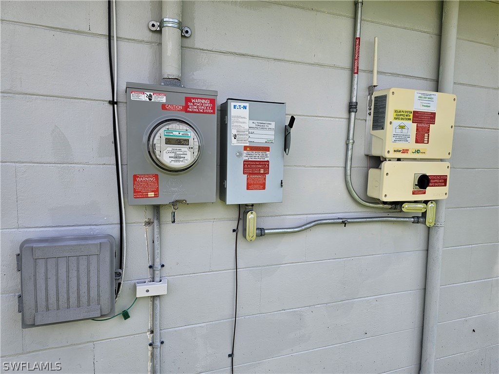 200 Oregon Road West Lehigh Acres, FL 33936 - Photo 12 of 18 a utility room with dryer and washer