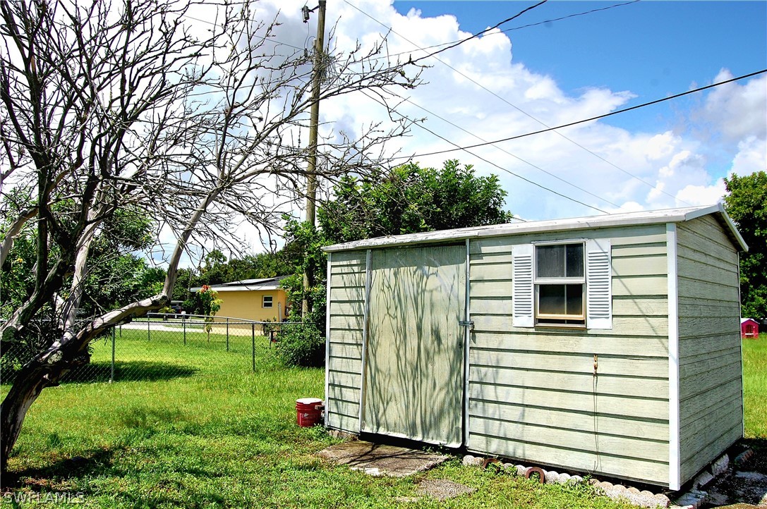 200 Oregon Road West Lehigh Acres, FL 33936 - Photo 15 of 18 a view of a back yard of the house