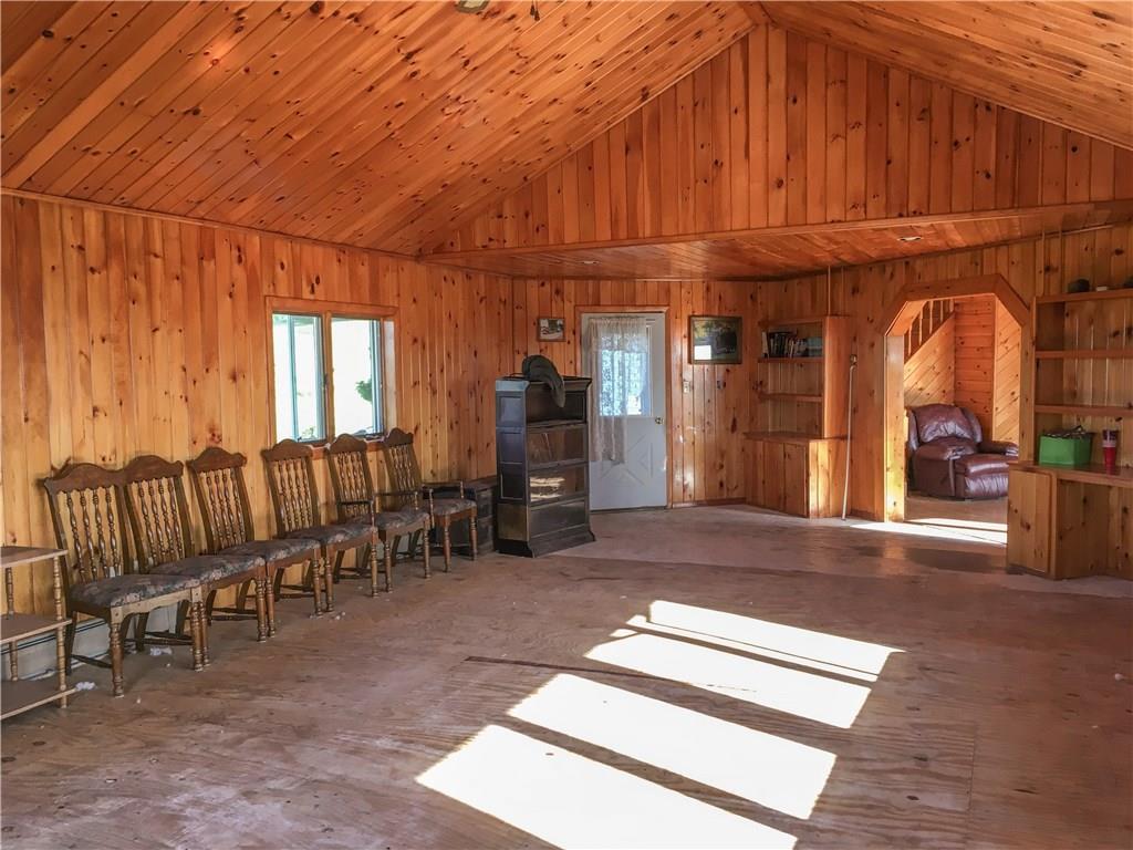 552 Enfield Road Lincoln, ME 04457 - Photo 13 of 35 Vaulted ceiling with beautiful wood...